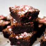 Fudgy peppermint brownies topped with crushed candy canes and flaky sea salt